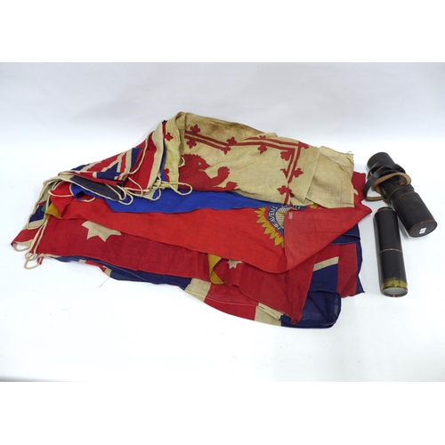 353 - A JH Steward brass draw telescope with leather case and vintage Union Jack flag bunting