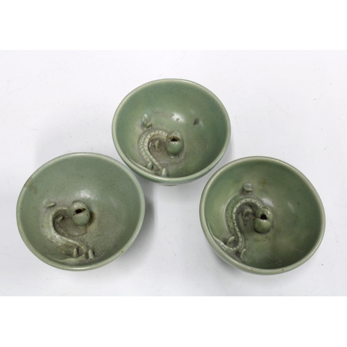 393 - Three Chinese celadon glazed serpent stem cups, (3) 13 x 9.5cm.