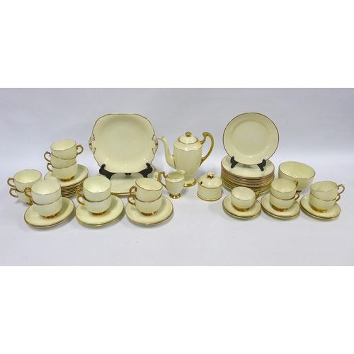 403 - Grosvenor China tea set, cream and gilt (approximately 55 pieces)