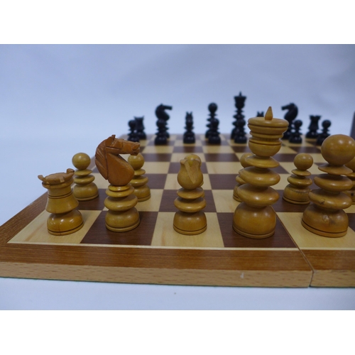 411 - Two chess sets with folding chess boards, one with backgammon markings on the reverse, 48 x 38cm ope... 