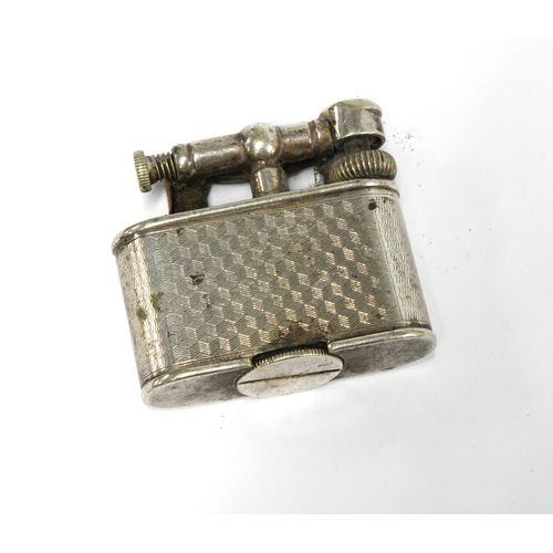 42 - Early 20th century Dunhill lighter in white metal case, base inscribed Pat No. 143752, 3.5cm