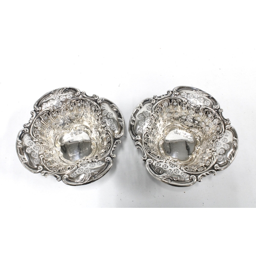 64 - A pair of of late Victorian silver sweetmeat dishes, Birmingham 1900, 12cm wide (2)