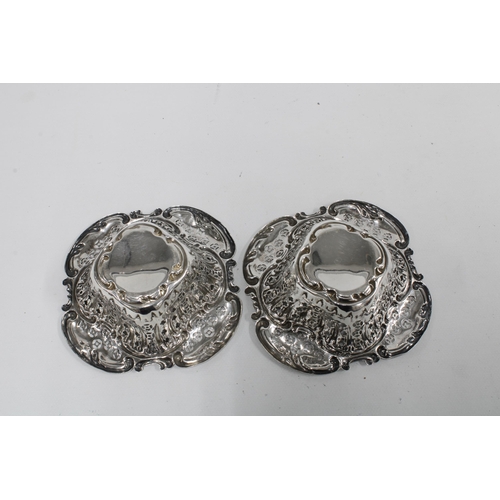 64 - A pair of of late Victorian silver sweetmeat dishes, Birmingham 1900, 12cm wide (2)