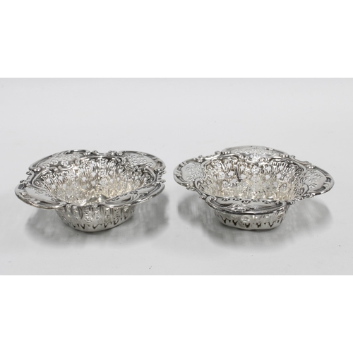 64 - A pair of of late Victorian silver sweetmeat dishes, Birmingham 1900, 12cm wide (2)