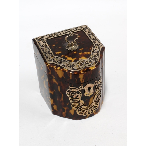 67 - A Victorian silver mounted tortoiseshell tea caddy, in the form of a miniature serpentine knife box,... 