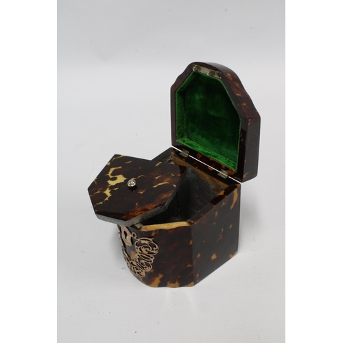 67 - A Victorian silver mounted tortoiseshell tea caddy, in the form of a miniature serpentine knife box,... 