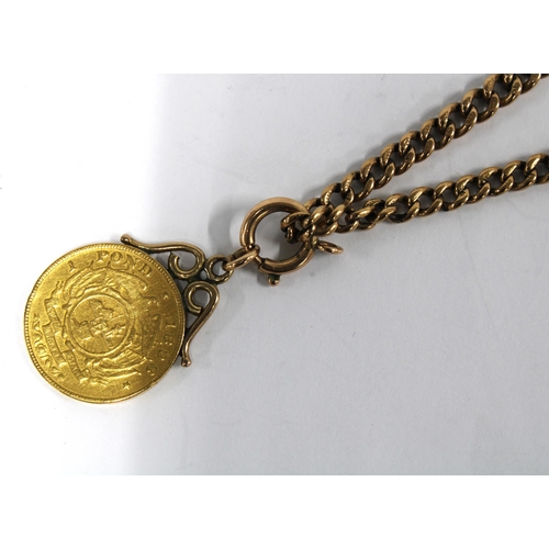 77 - South Africa 1 Pond gold coin in a 9ct gold setting, with a 9ct rose gold watch chain, each link sta... 