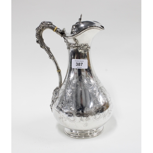 387 - Epns claret jug with fruit and vine handle, 29cm