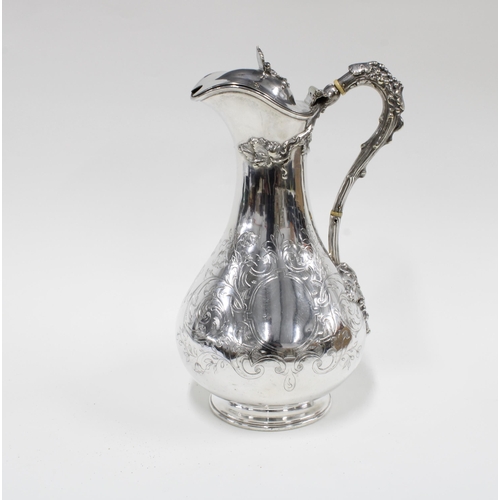 387 - Epns claret jug with fruit and vine handle, 29cm