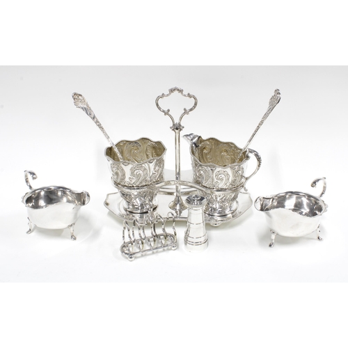 423 - Epns wares to include a toast rack, sauce boats and table stand with jug and bowl, etc