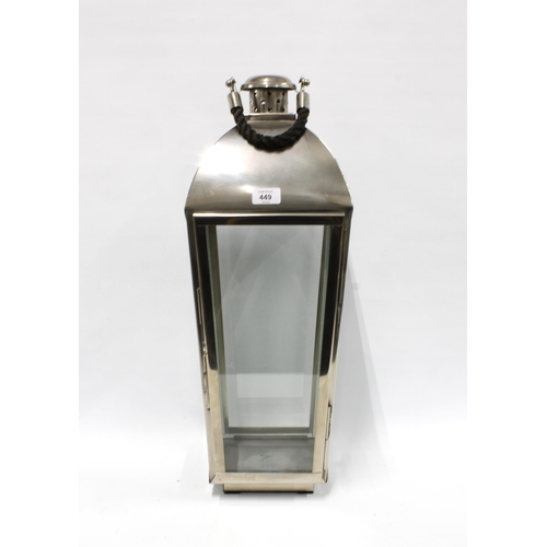 449 - Large brushed metal storm light / candle lantern, with glazed panels, rope handle, 63cm