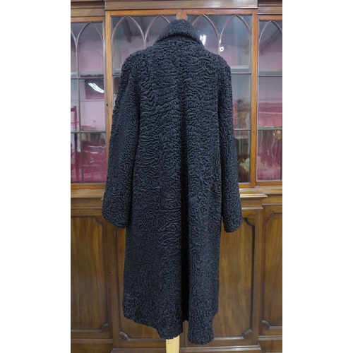 472 - Vintage black Astrakhan wool coat, 110cm collar to hem