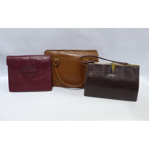 475 - Three vintage leather handbags, largest 35 x 24cm (3)