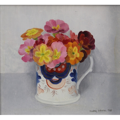 68 - AUDREY JOHNSON (1919-2005) oil on board still life of a Gaudy jug with pansies, signed lower right a... 