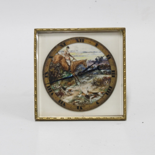 118 - Early 20th century Hunting Scene, painted ivorine clock, in a gilt metal case, Swiss 8days, the ease... 