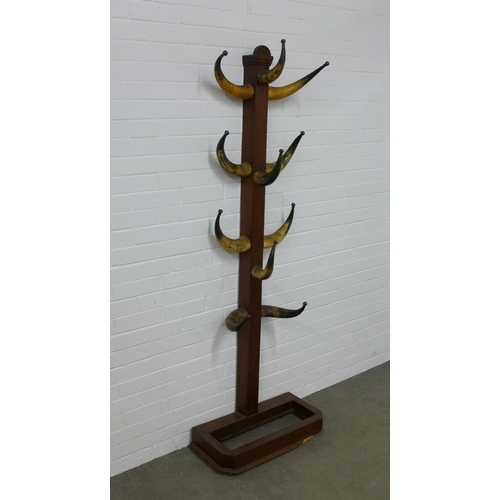 267 - Late 19th / early 20th century cow horn hat and coat stand, 64 x 190cm.