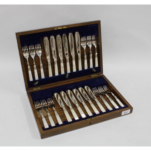 371 - Oak canteen with a set of twelve mother of pearl and Epns fish knives and forks