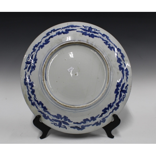 377 - Large Imari charger, typically decorated and with underglaze blue roundel to centre, 46cm diameter