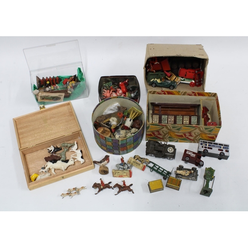 390 - A collection of vintage lead figures together with a Hornby tinplate station shop and accessories se... 