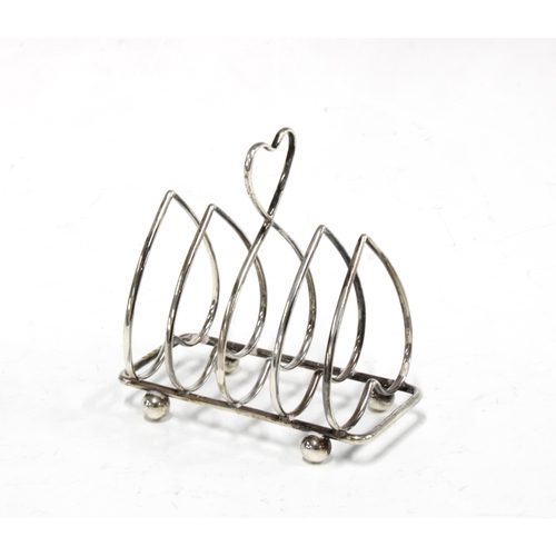 87 - Silver love heart  shaped toast rack, Birmingham 1938 . 9.5cm