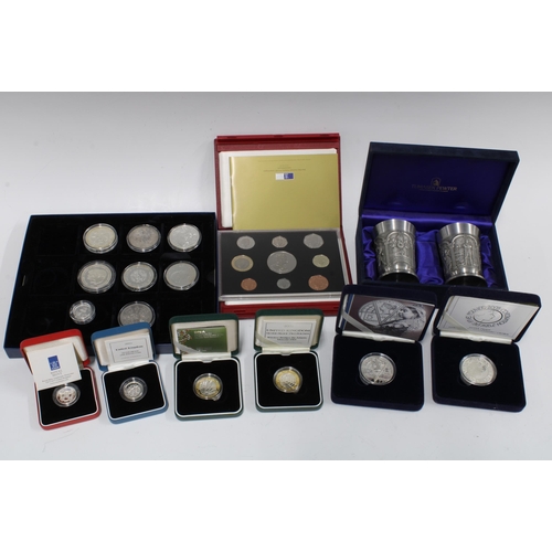 97 - A collection of boxed set commemorative coins and a pair of pewter vases, etc (a lot)