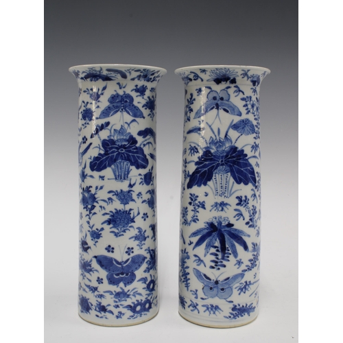 114 - A pair of Chinese blue and white sleeve vases, with birds and butterfly pattern, Kangxi marks but li... 