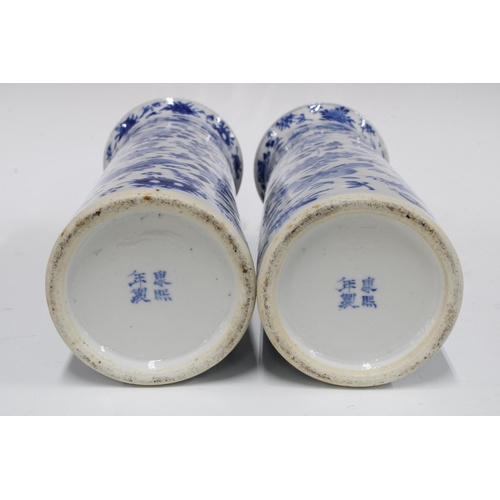 114 - A pair of Chinese blue and white sleeve vases, with birds and butterfly pattern, Kangxi marks but li... 