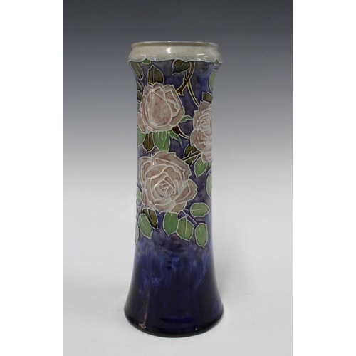 120 - Royal Doulton vase by Lily Partington, blue ground with a pink roses and foliage, , impressed marks ... 