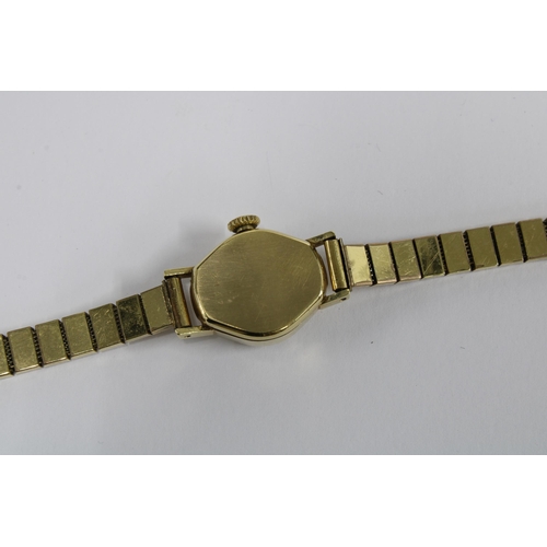 13 - BUCHERER, ladies 18ct gold cased wrist watch, inside of case stamped 750 and signed Bucherer, on an ... 