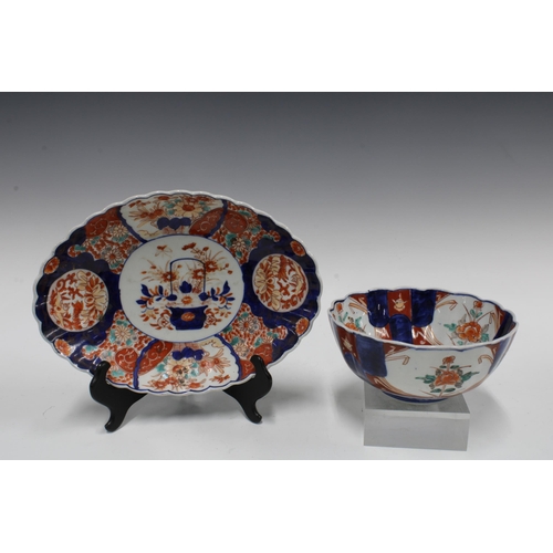 131 - Japanese Kutani porcelain plate, an Imari bowl and dish and a modern plate (4) 28cm.