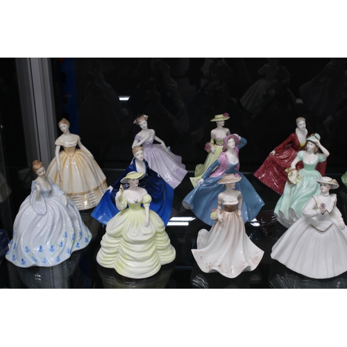 142 - Coalport Ladies of Fashion bone china figures, a group of twenty three (23)