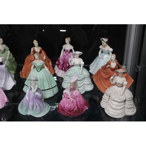 142 - Coalport Ladies of Fashion bone china figures, a group of twenty three (23)