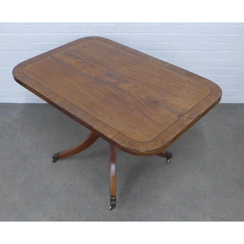 201 - Mahogany tilt top breakfast table with a cross banded top on a pedestal base with splayed legs endin... 