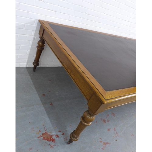 204 - Early 20th century large oak library or boardroom table, rectangular top with inset skiver and mould... 