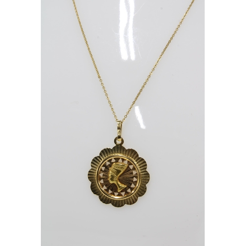 21 - Nefertiti gold pendant necklace, stamped 750 & K18