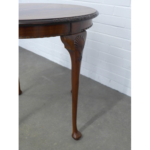 213 - Wylie & Lochhead mahogany table, quarter veneered circular top with shell carved cabriole legs, 70 x... 