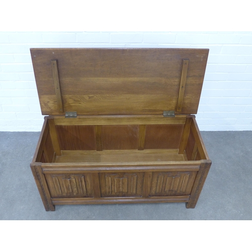 223 - Oak / elm blanket box, hinged top and linen fold carving to front, 106 x 52 x 46cm.