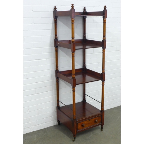 233 - Mahogany four tier whatnot with a single drawer to the base, on brass casters, 48 x 163 x 48cm.