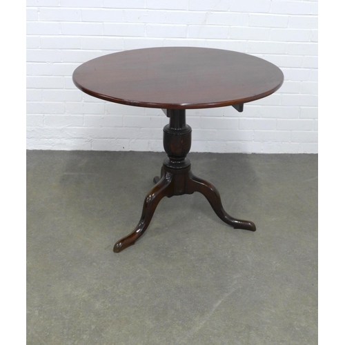 236 - Mahogany tilt top table on a pedestal base, 86 x 71cm.