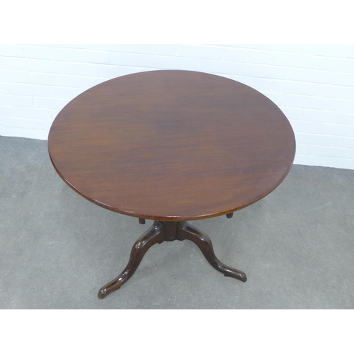 236 - Mahogany tilt top table on a pedestal base, 86 x 71cm.