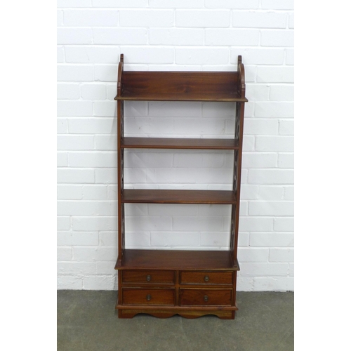 246 - Mahogany open bookcase, narrow proportions with fretwork sides, with four small drawers, 52 x 111 x ... 