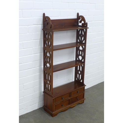 246 - Mahogany open bookcase, narrow proportions with fretwork sides, with four small drawers, 52 x 111 x ... 