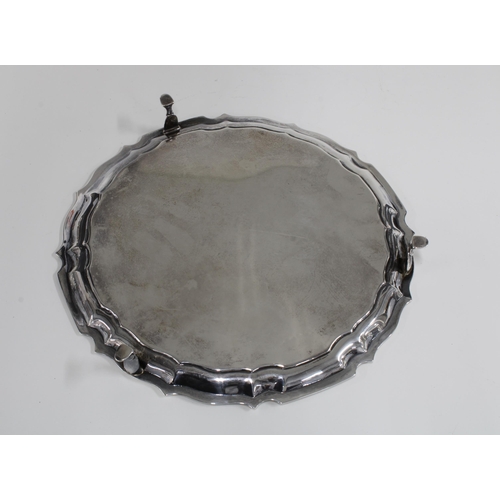 25 - Edwardian silver salver, pie crust edge and engraved initials to centre, Sheffield 1910, standing on... 