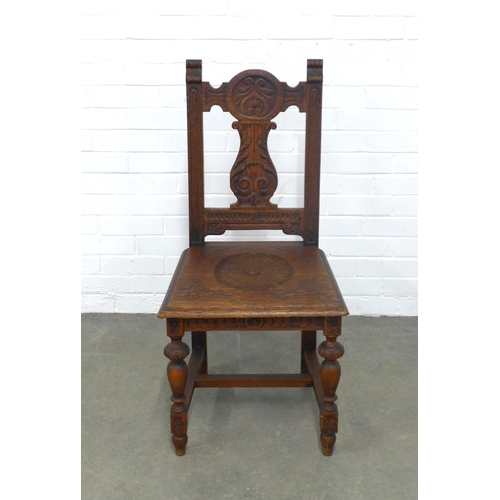 259 - Oak hall chair with carved splat and solid seat,  48 x 99 x 45cm.