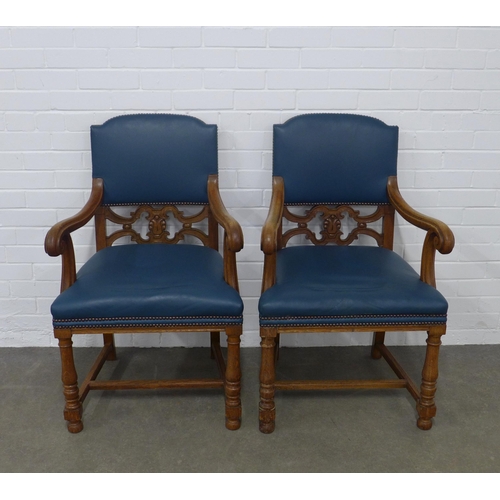 263 - Pair of early 20th century oak open arm chairs, 61 x 99 x 50cm. (2)