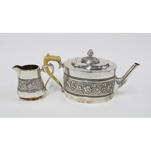 29 - Victorian silver teapot with faux ivory handle and a matching cream jug, Walker Crichton, Edinburgh ... 