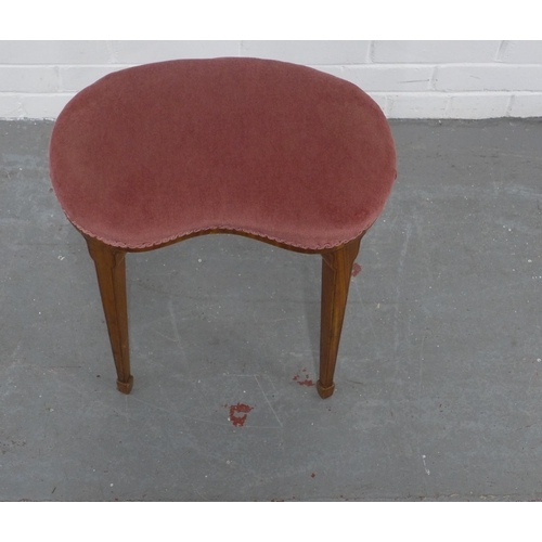 291 - Mahogany kidney shaped stool with red upholstered seat on tapering legs and spade feet, 46 x 47 x 32... 