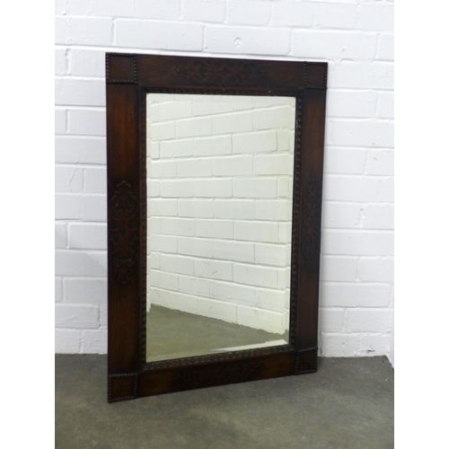 300 - Early 20th century oak wall mirror, 58 x 84cm.