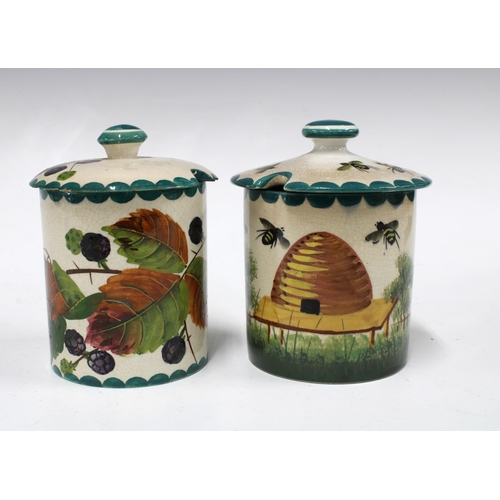 108 - Wemyss Ware, two preserve jars with covers, pattern include bee skep and blackberries, painted marks... 