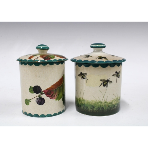 108 - Wemyss Ware, two preserve jars with covers, pattern include bee skep and blackberries, painted marks... 